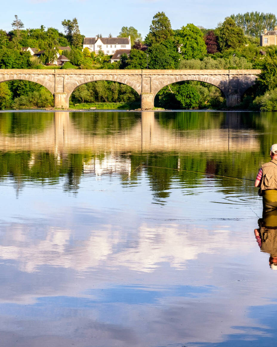 Man fishing in the River Tweed